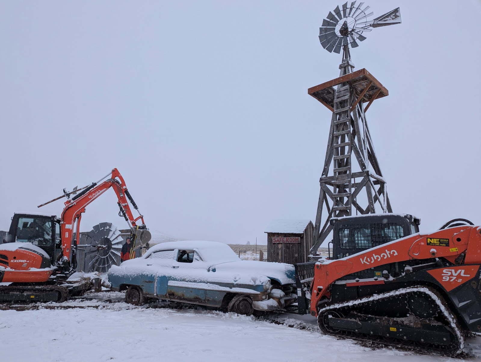 Installing the Cadillac at Turkey Toe - heavy equipment moving the vintage car into place