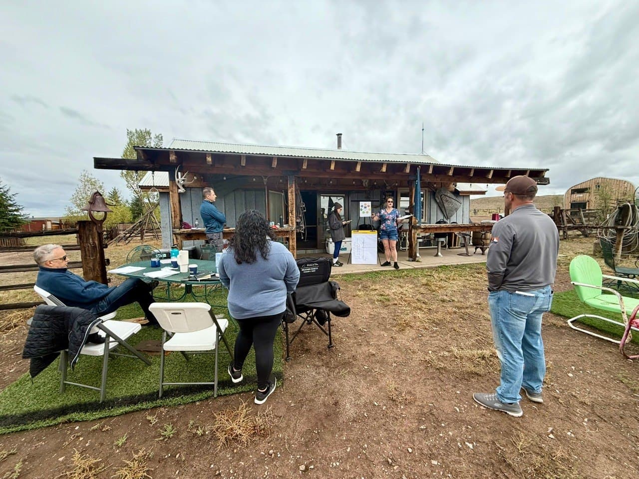 MVWD leadership team gathered outside the homestead cabin for a leadership focus day session at the Cadillac Wanch