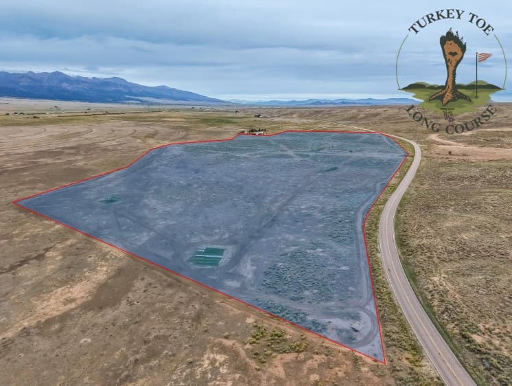Aerial view of Turkey Toe's grounds with the red perimeter line marking the course boundary — anything outside the red line is out of bounds