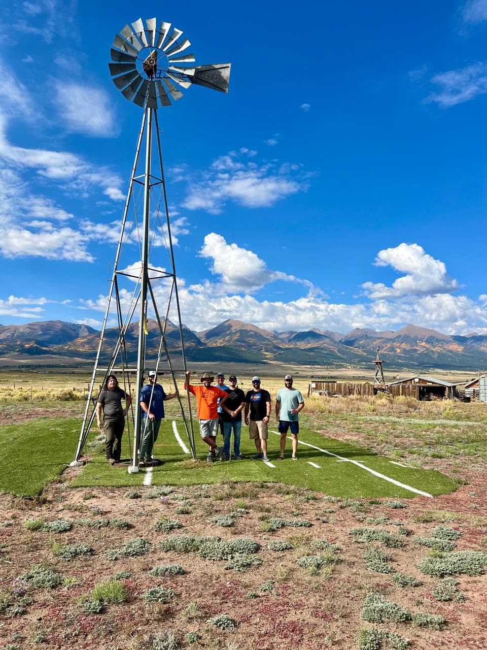 MVWD retreat group at the Turkey Toe windmill — Sangre de Cristos in fall color